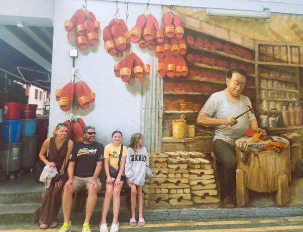 family-private-tour-looking-at-chinatown-street-art