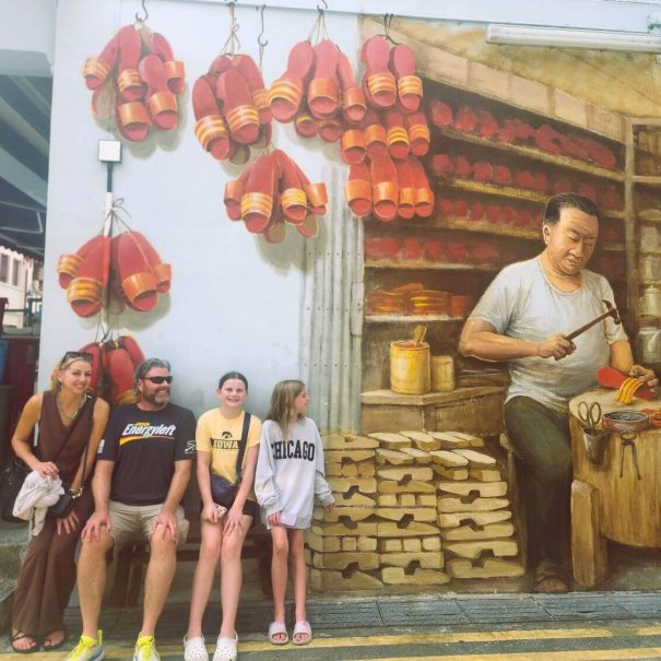 family-private-tour-looking-at-chinatown-street-art